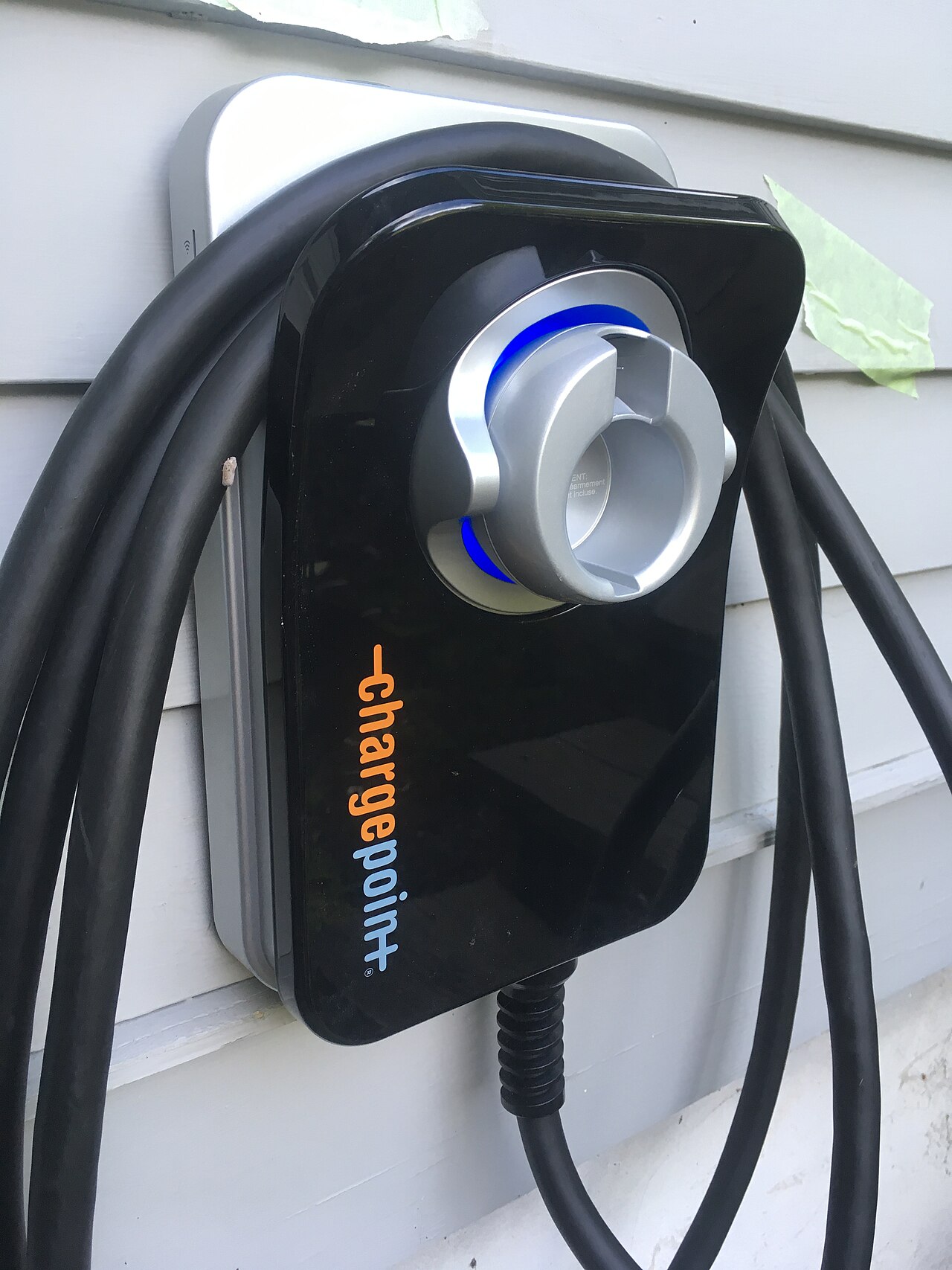 Electrician installing an EV charger